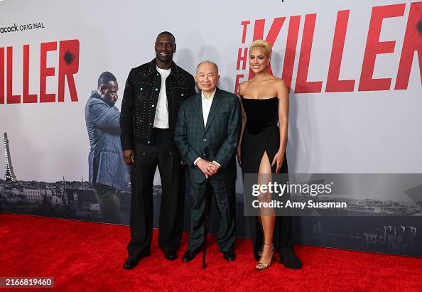 Emmanuel Sy Omar Sy, John Woo, and Nathalie Emmanuel attend the premiere of... News ...