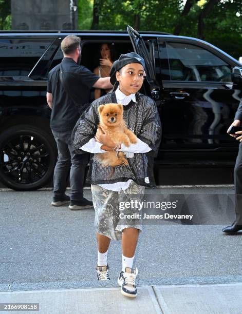 North West and Kim Kardashian are seen on the streets of Midtown Manhattan on August 14, 2024 in New York City.