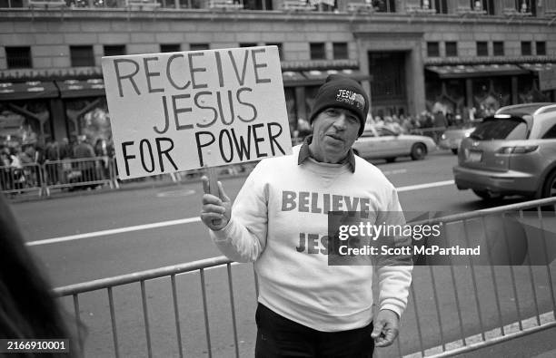 Portrait of an unidentified lay preacher as he holds a sign on 5th Avenue , New York, New York, December 23, 2006. His sign reads 'Receive Jesus For...