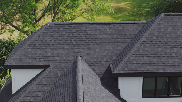 https://media.gettyimages.com/id/2166925797/video/drone-footage-of-new-roof-is-installed-on-a-private-house-day-time.jpg?b=1&s=640x640&k=20&c=X3jr59zoo-Amegz1eTQ9Xt20doMxjWwaC_ao7wtPlbY=