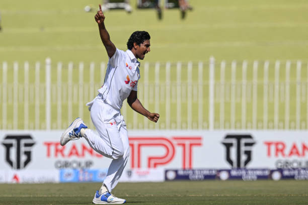 Bangladesh's Hasan Mahmud celebrates after taking the wicket of Pakistan's Abdullah Shafique during the first day of the first Test cricket match...