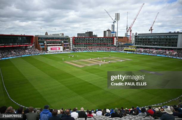 Sri Lanka's wicketkeeper Dinesh Chandimal ducks a high ball on day one of the first Test cricket match between England and Sri Lanka at Old Trafford...