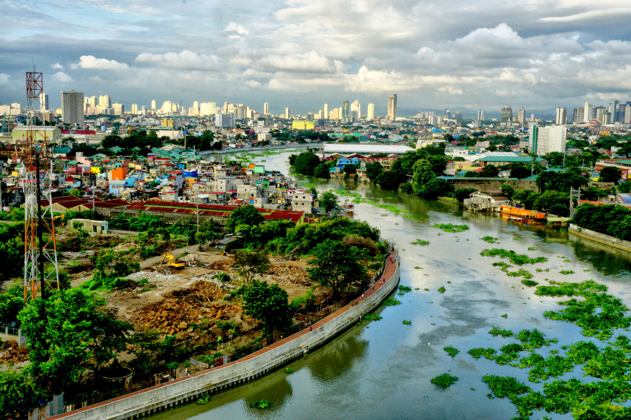 High Angle View Of River Amidst Buildings In City High Angle View Of River Amidst Buildings In City