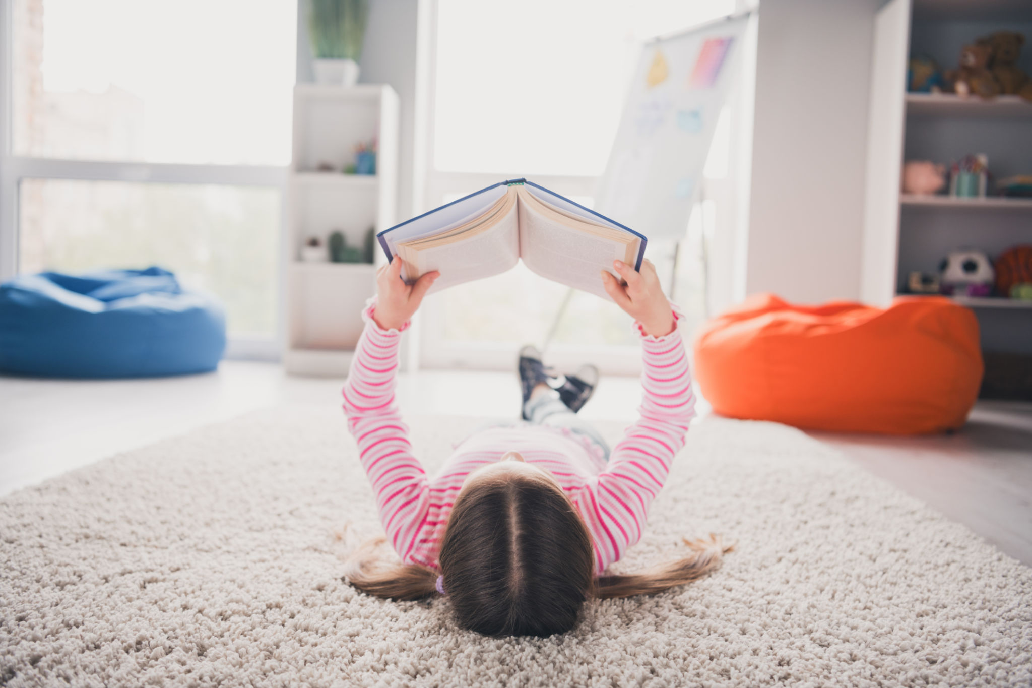 child reading book