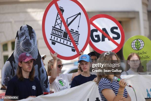 Supporters of the Fridays for Future climate action group protest outside the Federal Economy and Climate Action Ministry against the Borkum offshore...