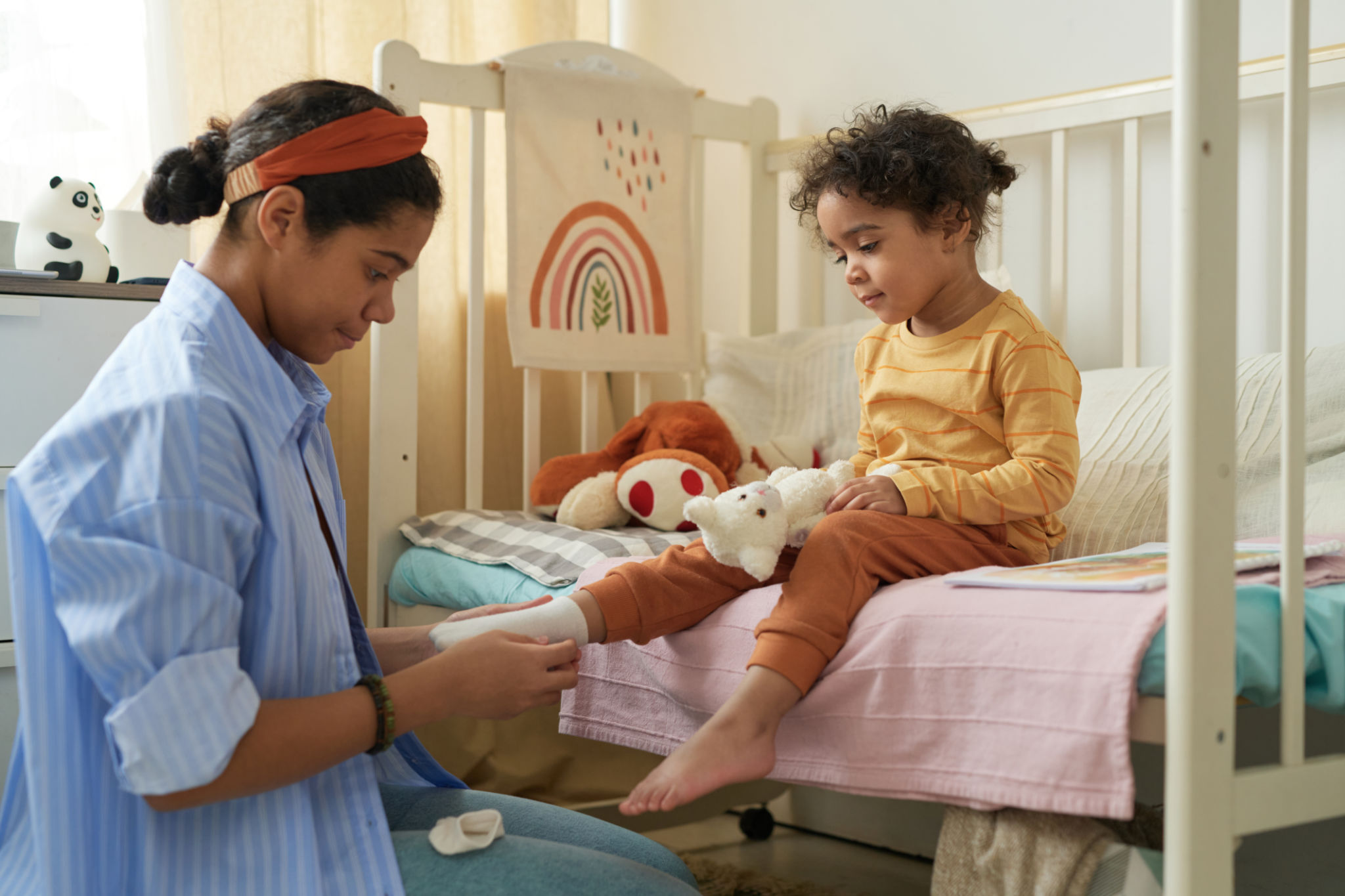 nanny caring for child
