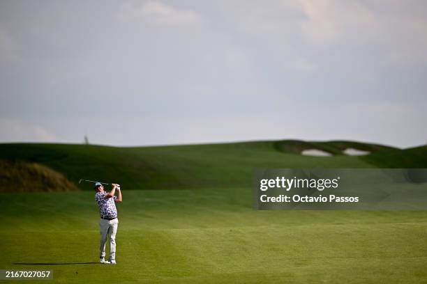 Jason Dufner of United States plays his third shot on the ninth hole on day two of the D+D REAL Czech Masters at PGA National OAKS Prague on August...