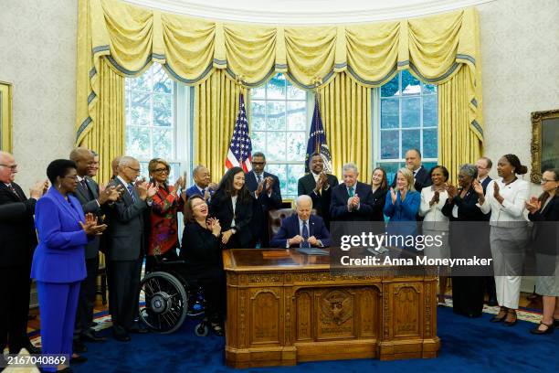 President Joe Biden gives remarks before signing a proclamation to designate the site of the Springfield 1908 Race Riot as a National Monument in the...
