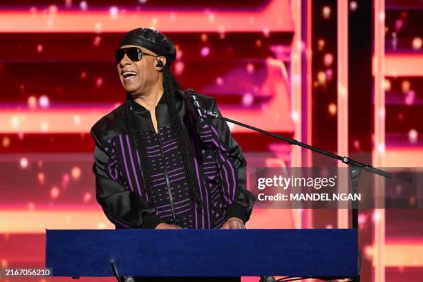 Musician Stevie Wonder performs on the third day of the Democratic National Convention at the United Center in Chicago, Illinois, on August 21, 2024....