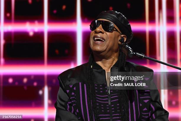 Singer-songwriter Stevie Wonder performs onstage on the third day of the Democratic National Convention at the United Center in Chicago, Illinois, on...