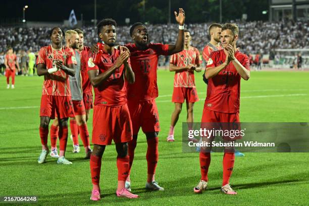 Mathys Tel, Kingsley Coman, Alphonso Davies and Joshua Kimmich of FC Bayern Muenchen celebrate after the DFB-Pokal match between SSV Ulm 1846 and FC...