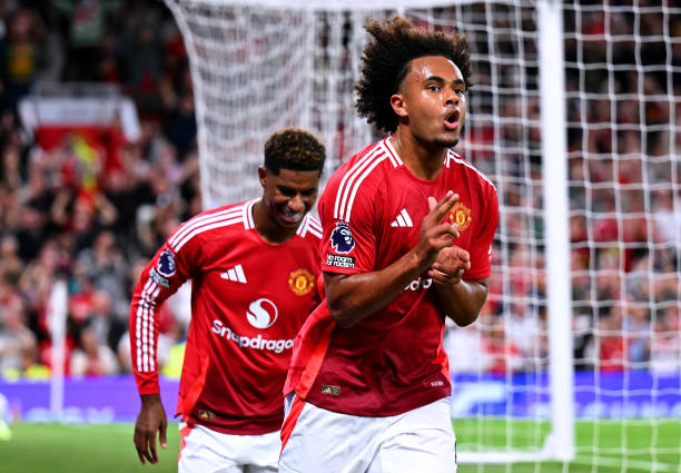 Joshua Zirkzee of Manchester United celebrates scoring his team's first goal during the Premier League match between Manchester United FC and Fulham...