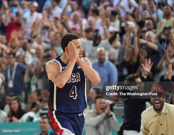 Paris, France United States shooting guard Stephen Curry reacts after making a basket during a men's basketball final held at Bercy Arena at the 2024...