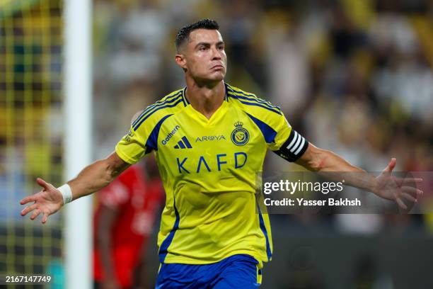 Cristiano Ronaldo of Al Nassr celebrating after scores the 1st goal during the Saudi Pro League match between Al Nassr and Al Raed at Al Awwal Park...