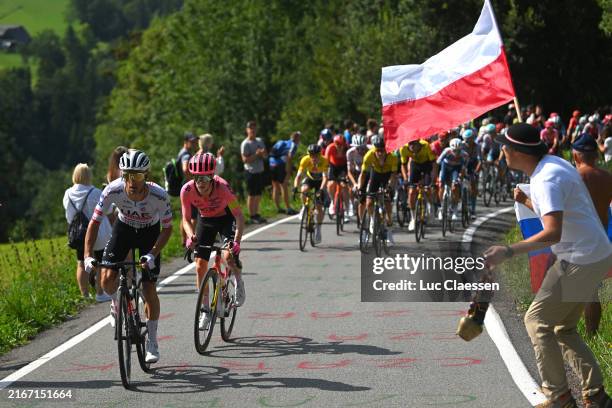 Rafal Majka of Poland and UEA Team Emirates and Archie Ryan of Ireland and Team EF Education - Easypost attack while fans cheer during the 81st Tour...