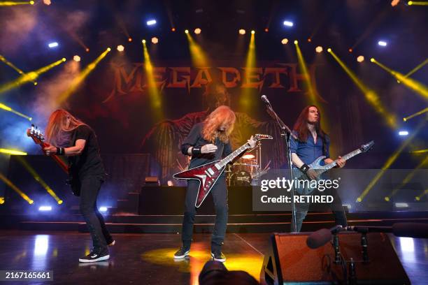 James LoMenzo, Dave Mustaine and Teemu Mäntysaari, members of the of the American thrash metal band Megadeth, perform during the Megadeth 'Destroy...