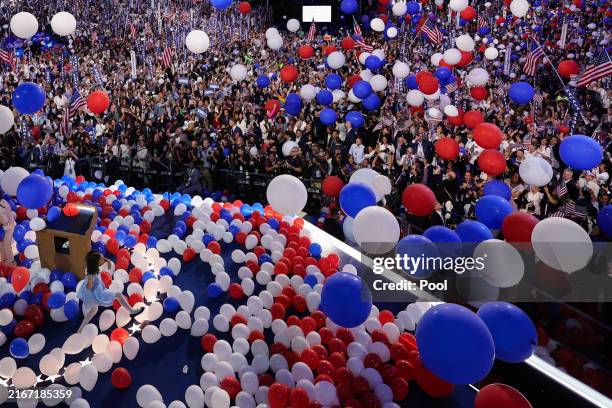 Democratic presidential nominee and U.S. Vice President Kamala Harris' great-niece Leela plays with balloons onstage on Day 4 of the Democratic...