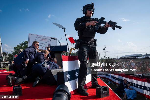 Butler, PA U.S. Secret Service agents and counter assault team react moments after shots were fired toward Republican presidential candidate former...