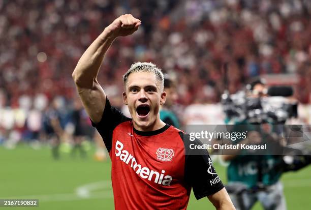 Florian Wirtz of Bayer 04 Leverkusen celebrates following the team's victory in the penalty shoot out during the DFL Supercup 2024 match between...