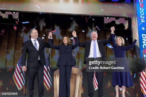 Second gentleman Doug Emhoff, from left, Democratic presidential nominee Vice President Kamala Harris, her running mate Minnesota Gov. Tim Walz and...