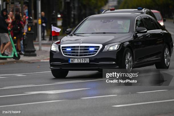 Limousine carrying Polish President Andrzej Duda arrives at the Belvedere Palace, where he will meet Indian Prime Minister Narendra Modi, on August...