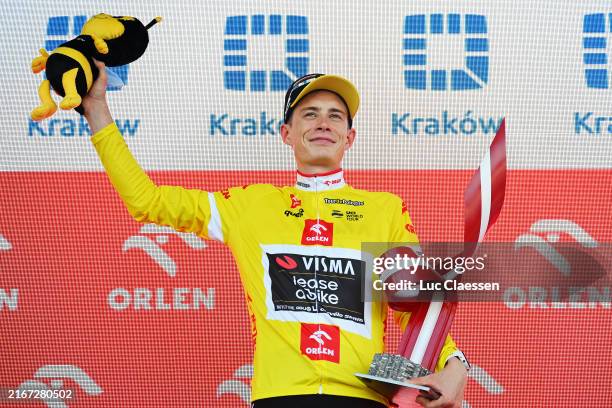 Jonas Vingegaard Hansen of Denmark and Team Visma - Lease a Bike - Yellow Leader Jersey celebrates at podium as final overall race winner during the...