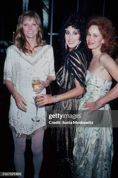 Cheryl Tiegs, Cher and Karen Black attend a party at Halston's apartment in New York City circa 1982