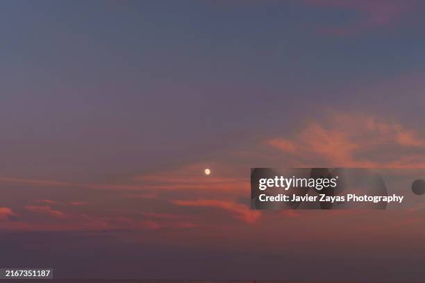 orange sky in the afternoon - morning-afternoon-evening stock pictures, royalty-free photos & images