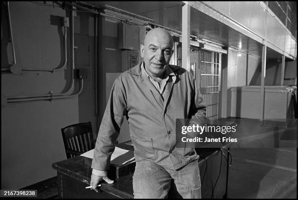 Portrait of American actor Telly Savalas on the set of TV movie 'Alcatraz: The Whole Shocking Story' in the former Alcatraz Federal Penitentiary on...