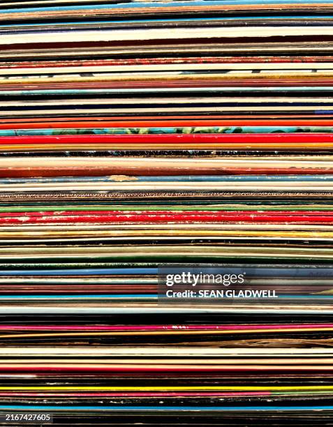 stacked vinyl record collection - stack of vinyl records stock pictures, royalty-free photos & images