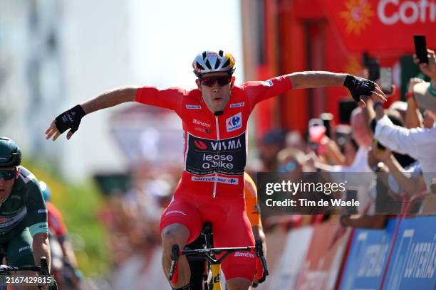 Wout van Aert of Belgium and Team Visma | Lease a Bike - Red Leader Jersey celebrates at finish line as stage winner during the La Vuelta - 79th Tour...