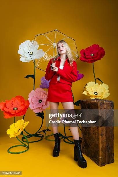 fashionable woman wearing red outfit - see through shoe stock pictures, royalty-free photos & images
