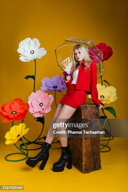 fashionable woman wearing red outfit - see through shoe stock pictures, royalty-free photos & images