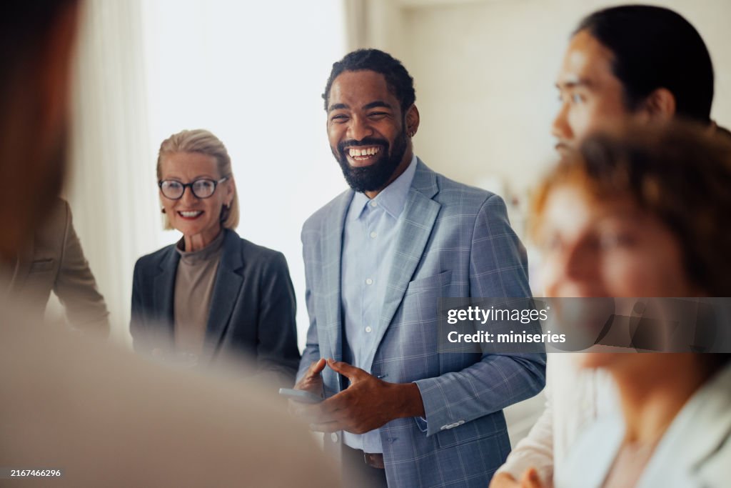 Diverse Group of Professionals Collaborating in Modern Office