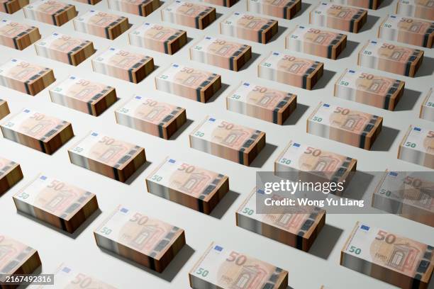 50 euro banknotes on stacks - how many bills in a stack stock pictures, royalty-free photos & images