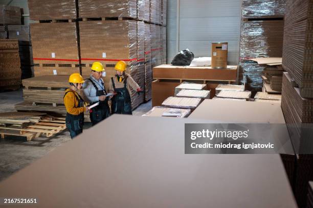 factory inspectors working in a warehouse - inventory management stock pictures, royalty-free photos & images