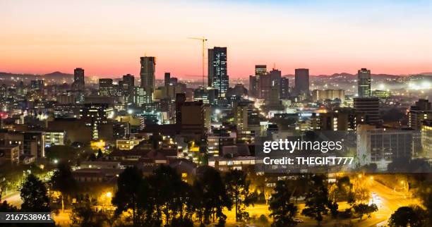pretoria cityscape silhouette at sunset - pretoria city stock pictures, royalty-free photos & images
