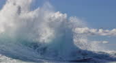 Ocean Wave Exploding Against Rocks And Cliff Face With Force And Power ...