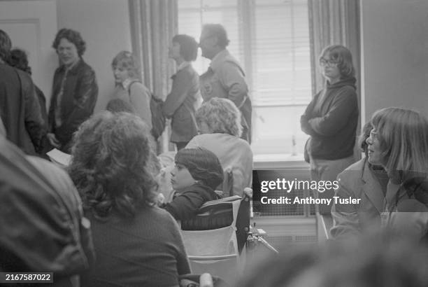 At the beginning of the 'Section 504' sit-in, disability rights activists, including Ann Cupolo , gather in a room at the San Francisco Federal...