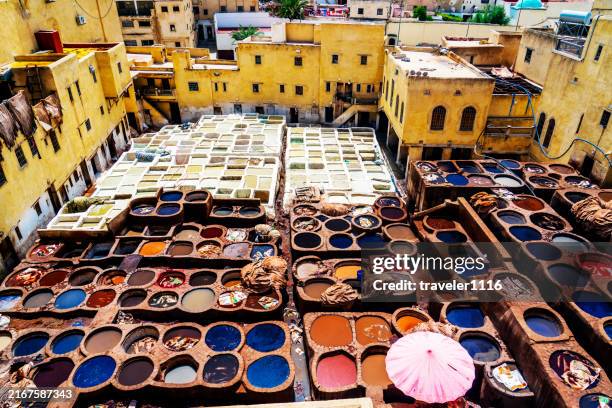 chouara tannery in fez (fes), morocco - morocco stock pictures, royalty-free photos & images