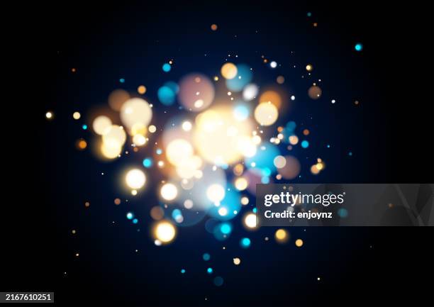 warm gold and blue sparkling light background - string lights black background stock illustrations