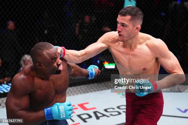 Cam Rowston of Australia punches Torrez Finney in a middleweight fight during Dana White's Contender Series, season eight week two on August 20, 2024...