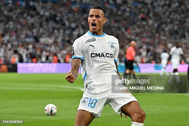 Marseille's English forward Mason Greenwood celebrates after scoring his team's second goal during the French L1 football match between Olympique...