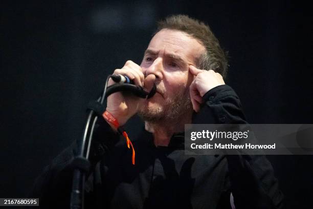 Robert Del Naja performs for Massive Attack at Clifton Downs on August 25, 2024 in Bristol, England. Long-time climate campaigners Robert Del Naja...