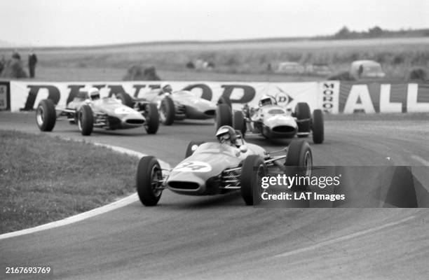 Jochen Rindt, Brabham BT16 Ford, leads Chris Amon, Merlyn Mk9 Ford, and Alan Rees, Brabham BT16 Ford during the Reims at Reims-Gueux on July 04, 1965...