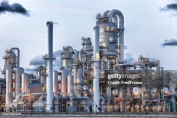 oil refinery plant, chemical factory, oil and gas industrial zone, oil pipeline with valves in large oil refinery - natural gas stock pictures, royalty-free photos & images