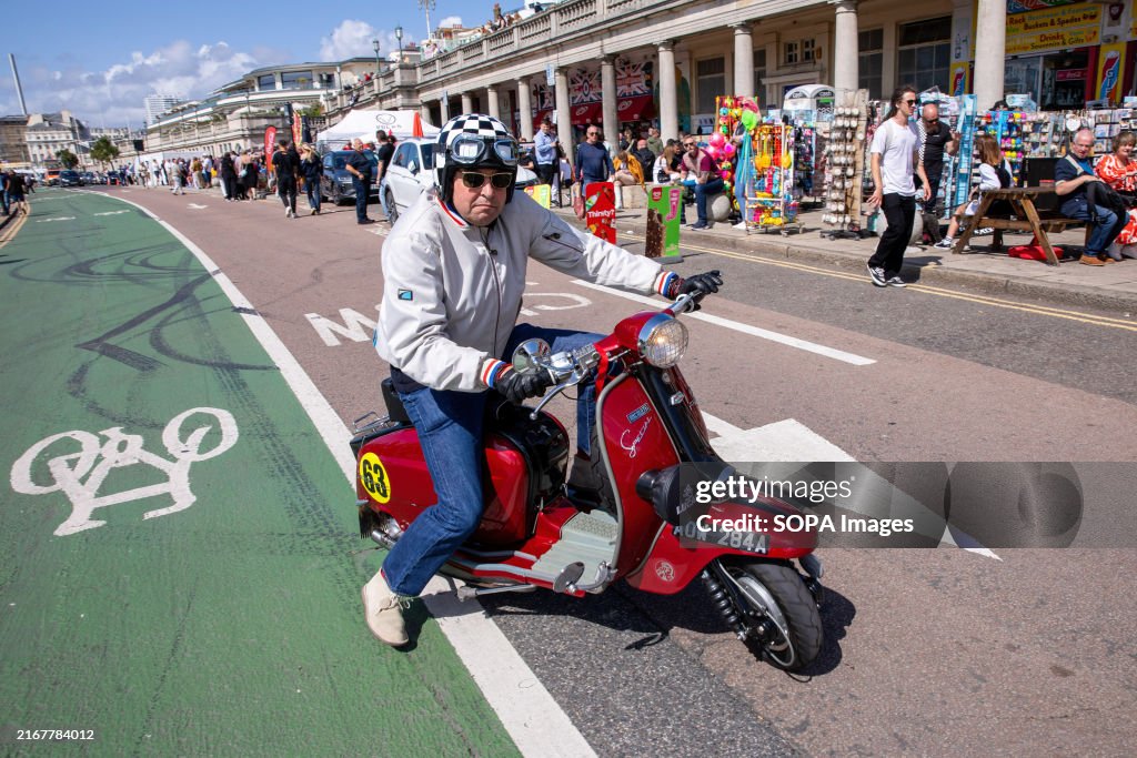 Mod Rocker Scooter A Mod rides a red scooter during the Brighton Mod Weekender.... News ...