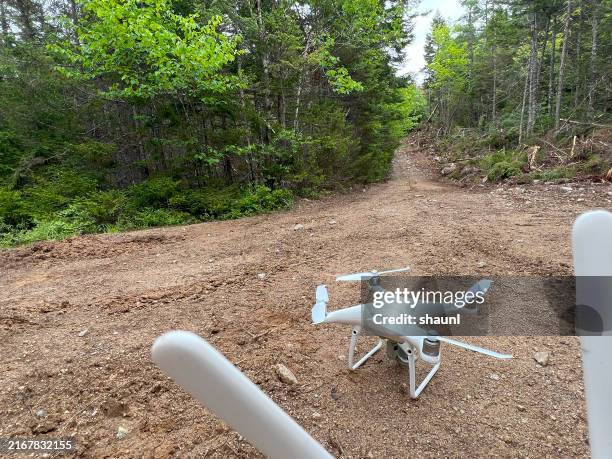 surveying wildfire damage with drone - land surveyor stock pictures, royalty-free photos & images