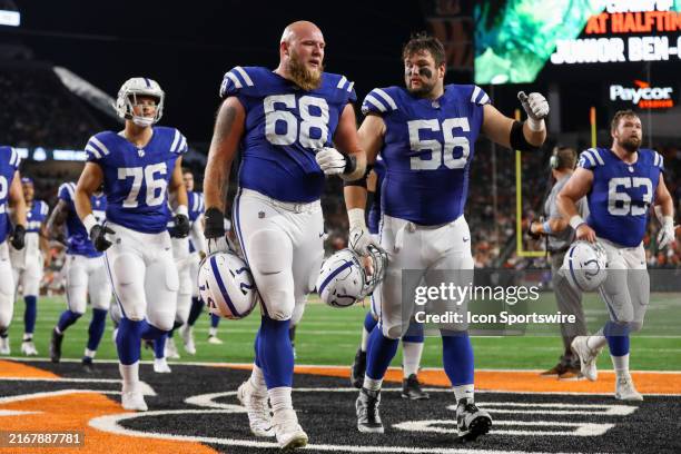 Indianapolis Colts guard Dalton Tucker talks with guard Quenton Nelson during halftime in the game against the Indianapolis Colts and the Cincinnati...