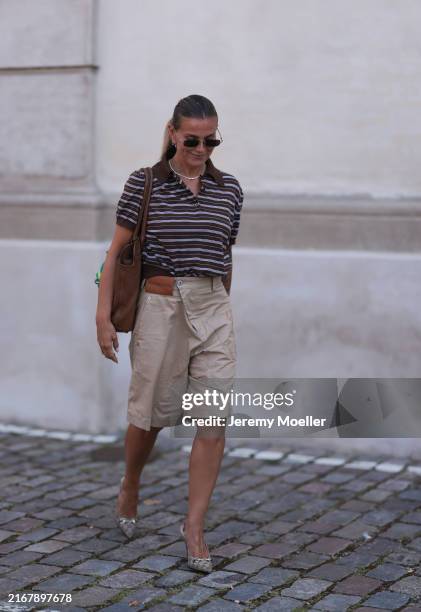 Janka Polliani is seen wearing rectangular sunglasses with a metal upper frame from Gucci, several earrings and studs, a diamond necklace, a brown...